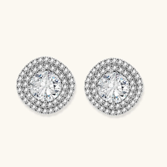 Double halo sterling silver stud earrings with brilliant round moissanite center stones and pavΓ© crystal accents