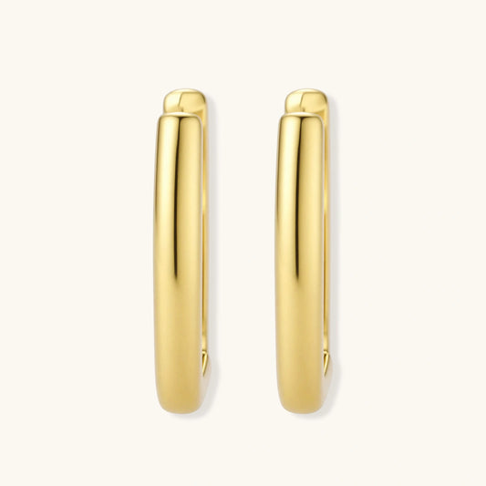 Polished gold-plated sterling silver hoop earrings with hinged closure mechanism on white background.