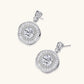 Art Deco-inspired sterling silver drop earrings with tiered moissanite stones in geometric sunburst design