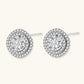 Double halo sterling silver stud earrings with brilliant round moissanite center stones and pavé crystal accents