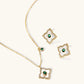 Gold-plated jewelry set with diamond-shaped pendants featuring white centers, green stones, and sparkling zirconia borders