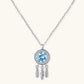 Sterling silver dreamcatcher pendant with blue moissanite center and three feather charms on adjustable chain.