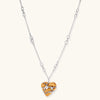 Adjustable brass chain necklace with natural wood heart pendant featuring wire wrapping and zirconia crystal accents