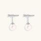 Rhodium-plated sterling silver ear jacket earrings with diamond-set horizontal bar and freshwater pearl drop