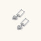 Platinum-plated 925 sterling silver rectangular hoop earrings with twisted ring connector and ribbed heart charm pendant.