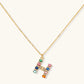 Gold-plated letter H jewelry set with multicolor zirconia stones in emerald cuts, showing necklace pendant and matching earrings