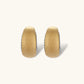 Small gold-plated hoop earrings with crystal accents and brushed finish on white background.