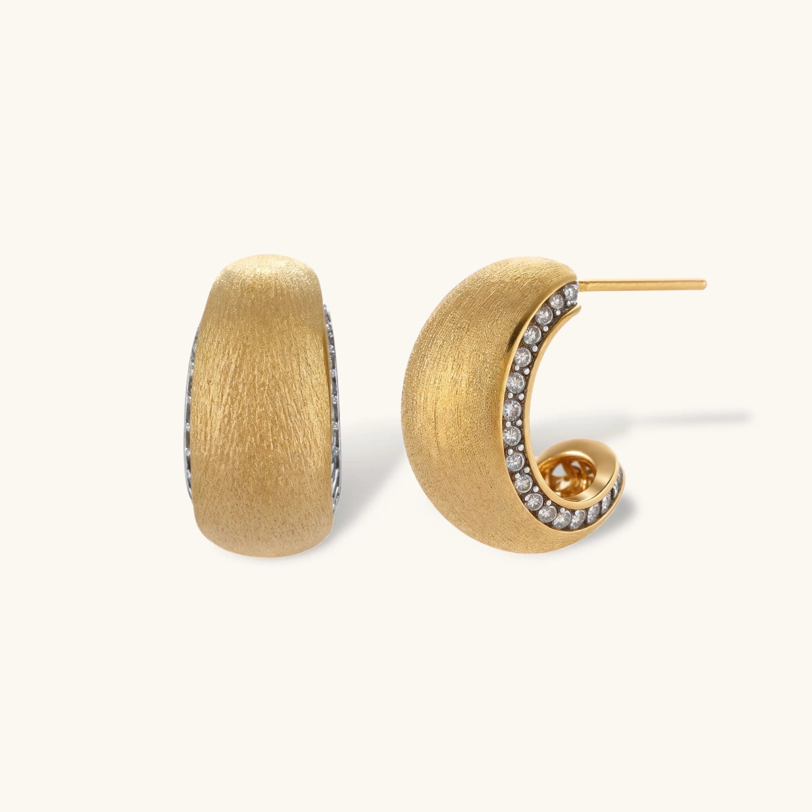 Small gold-plated hoop earrings with crystal accents and brushed finish on white background.